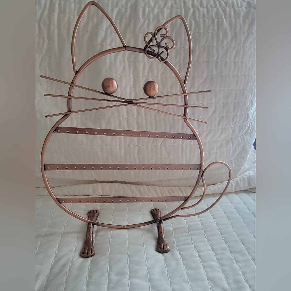 Adorable copper colored cat earring holder,  50+ holes Measures 12.5"×11.5"